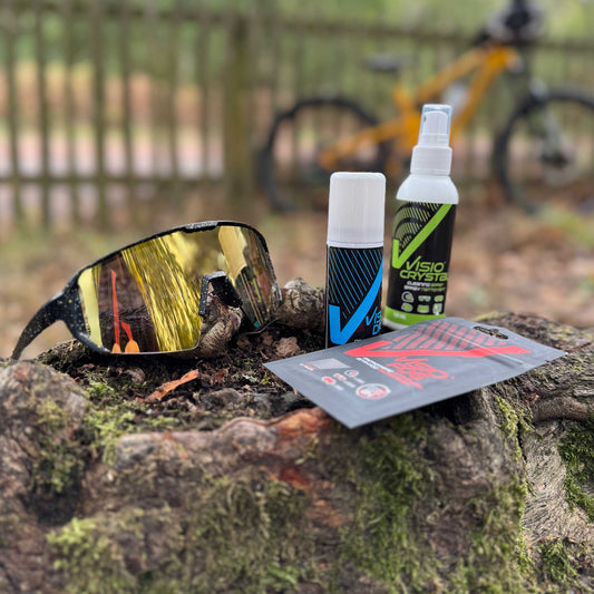 collection of visiofog, visiodry and visiocrystal in the outdoors with a bicycle and googles