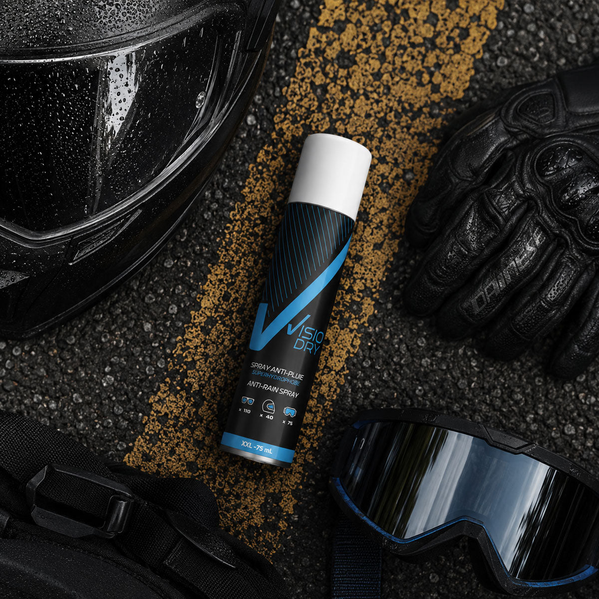 VisioDry 75ml aerosol spray on road surface next to motorbike helmet and motorbike gear