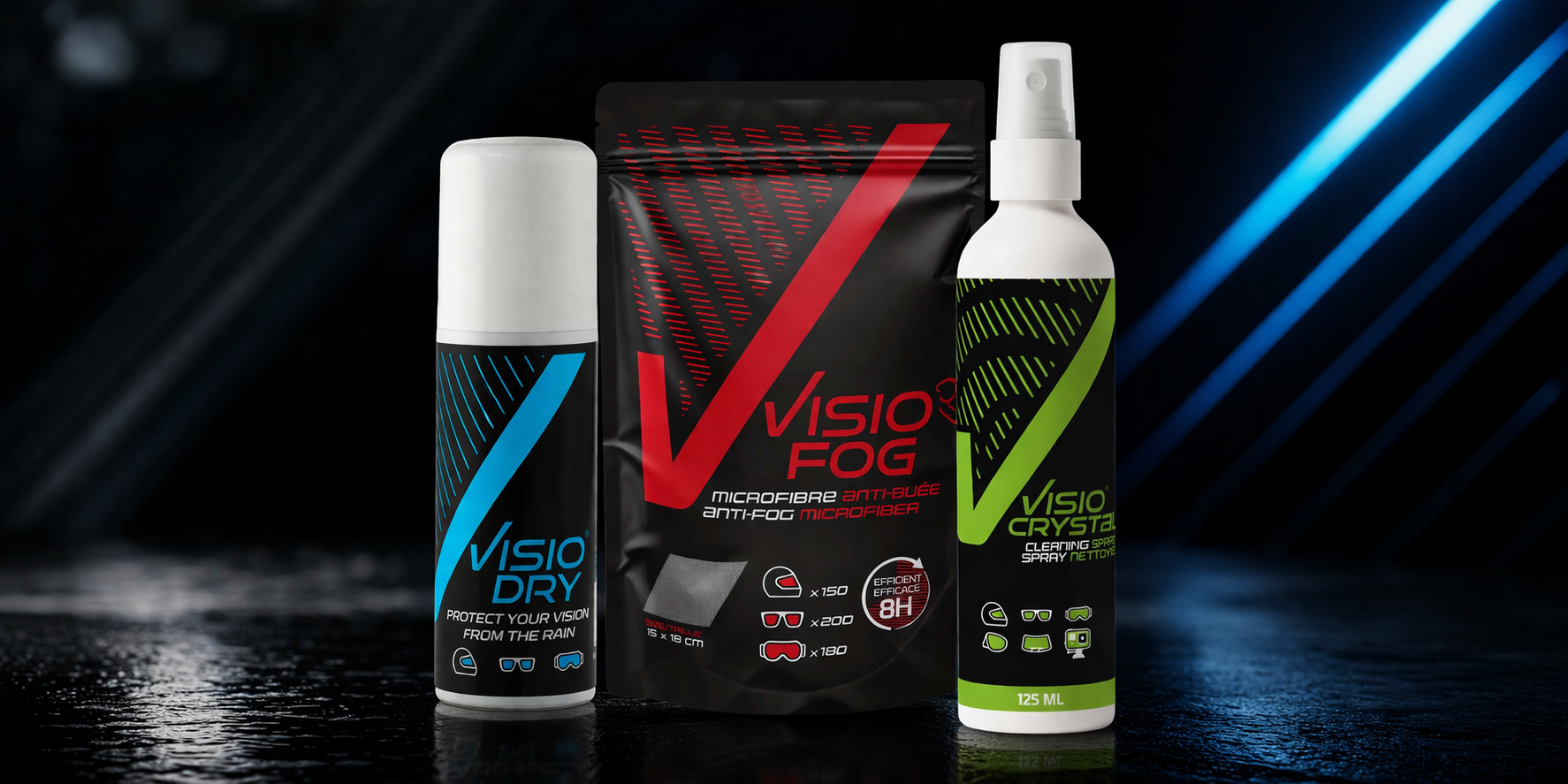 VisioDry Essentials Kit : anti-rain aerosol, anti-fog microfibre wipe and surface cleaner spray on a dark background